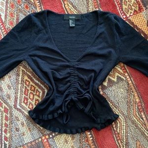 Forever 21 black ruched sweater top with ruffles, very cute for colder weather!